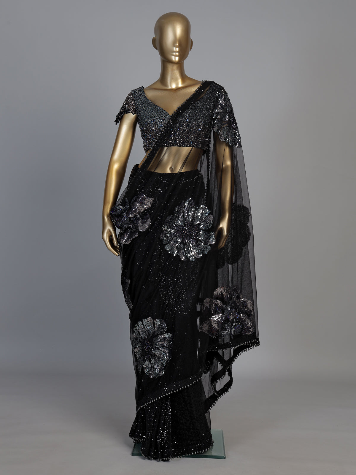 Black net designer saree with floral sequin embellishments