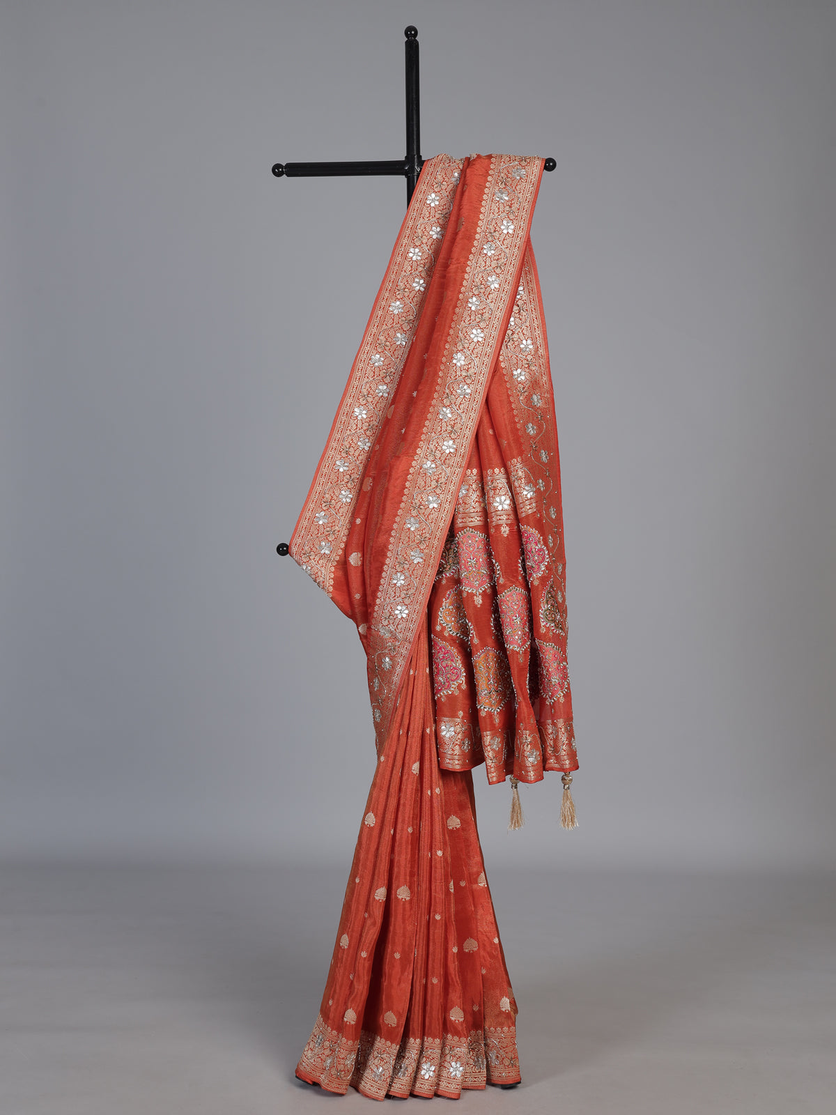 Rust orange dola silk saree with floral butti handwork