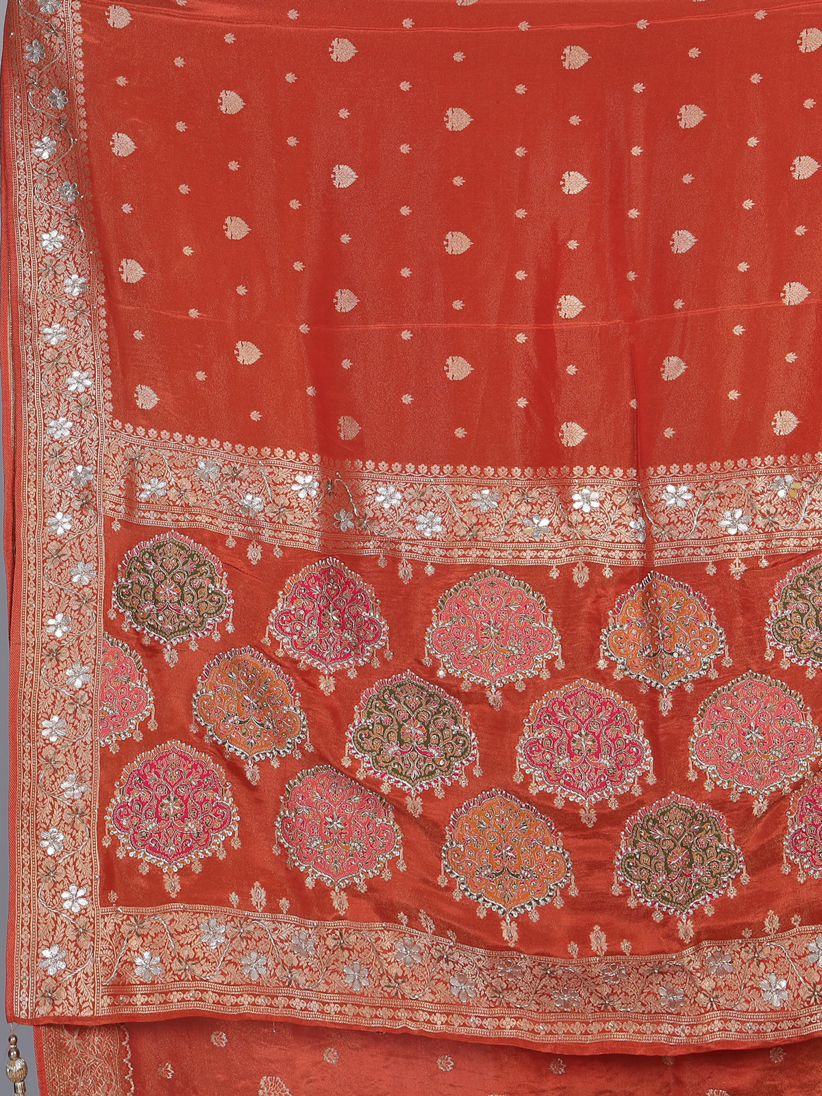Rust orange dola silk saree with floral butti handwork