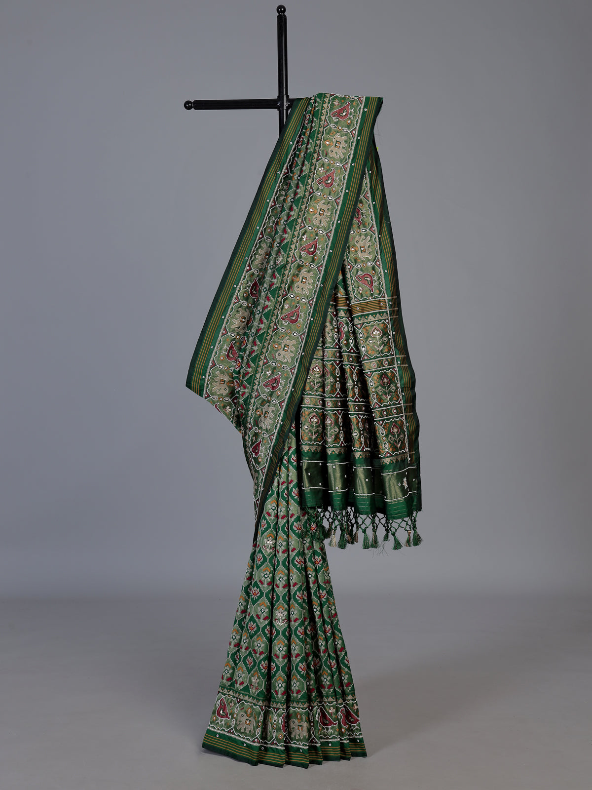 Green art patola silk saree with traditional motif handwork