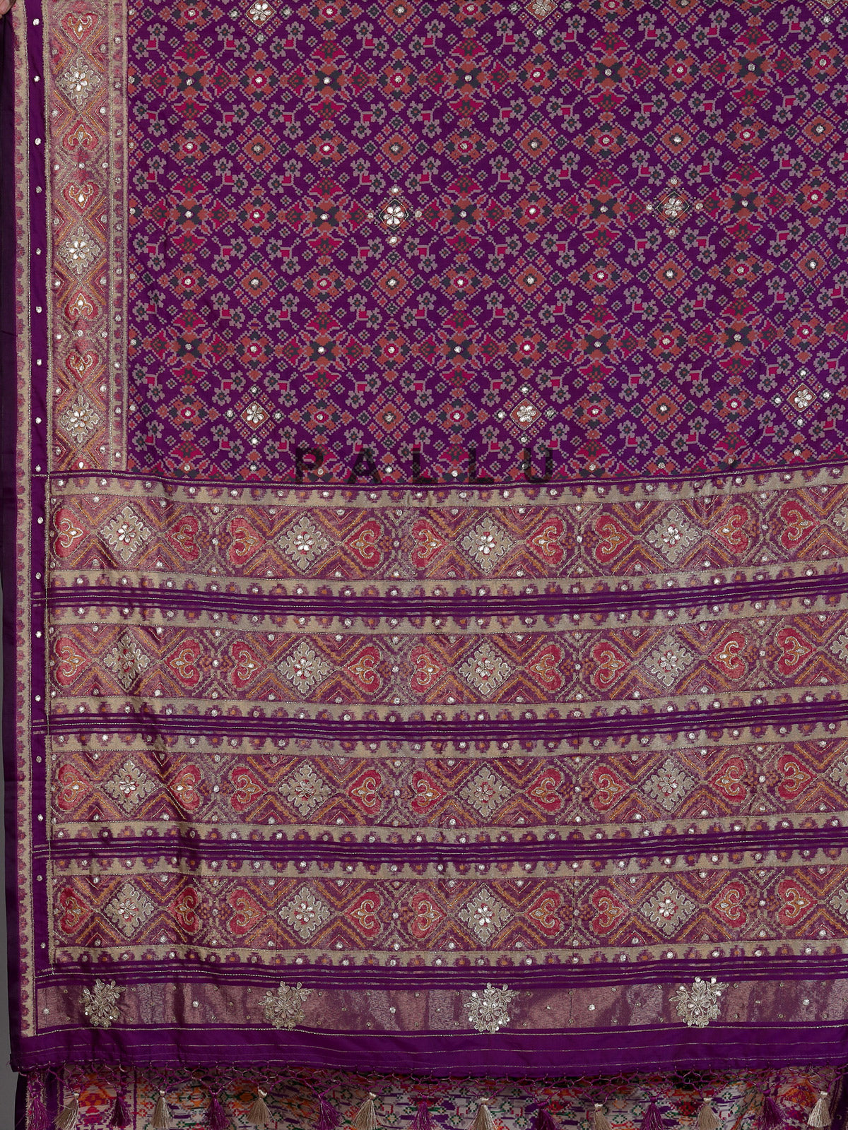 Purple art patola silk saree with rich zardosi detailing