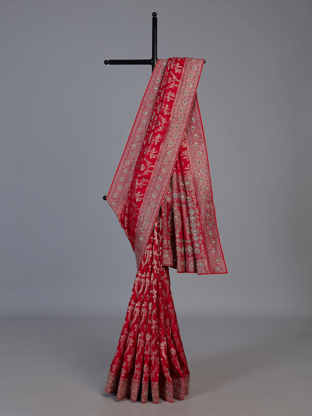 Red modal satin silk saree with bridal embellished elegance
