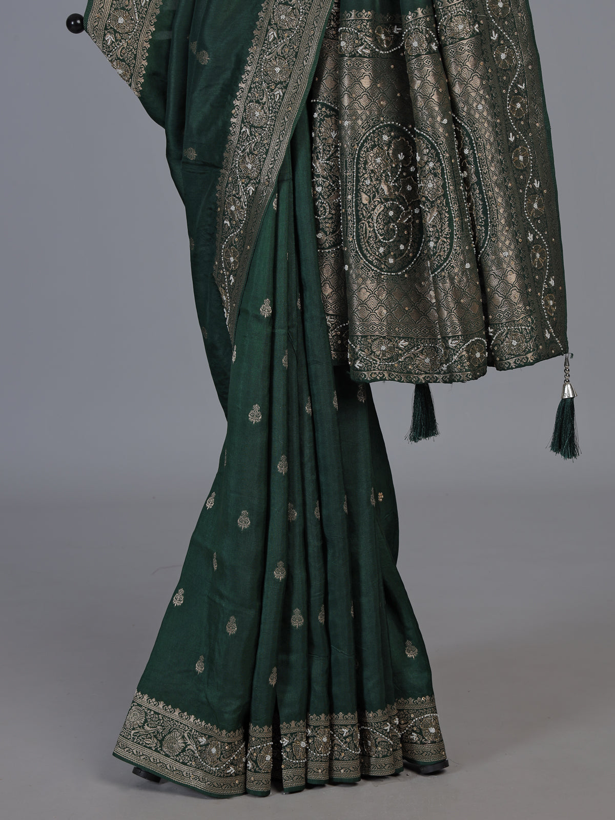 Green dola silk saree with rich butti elegance