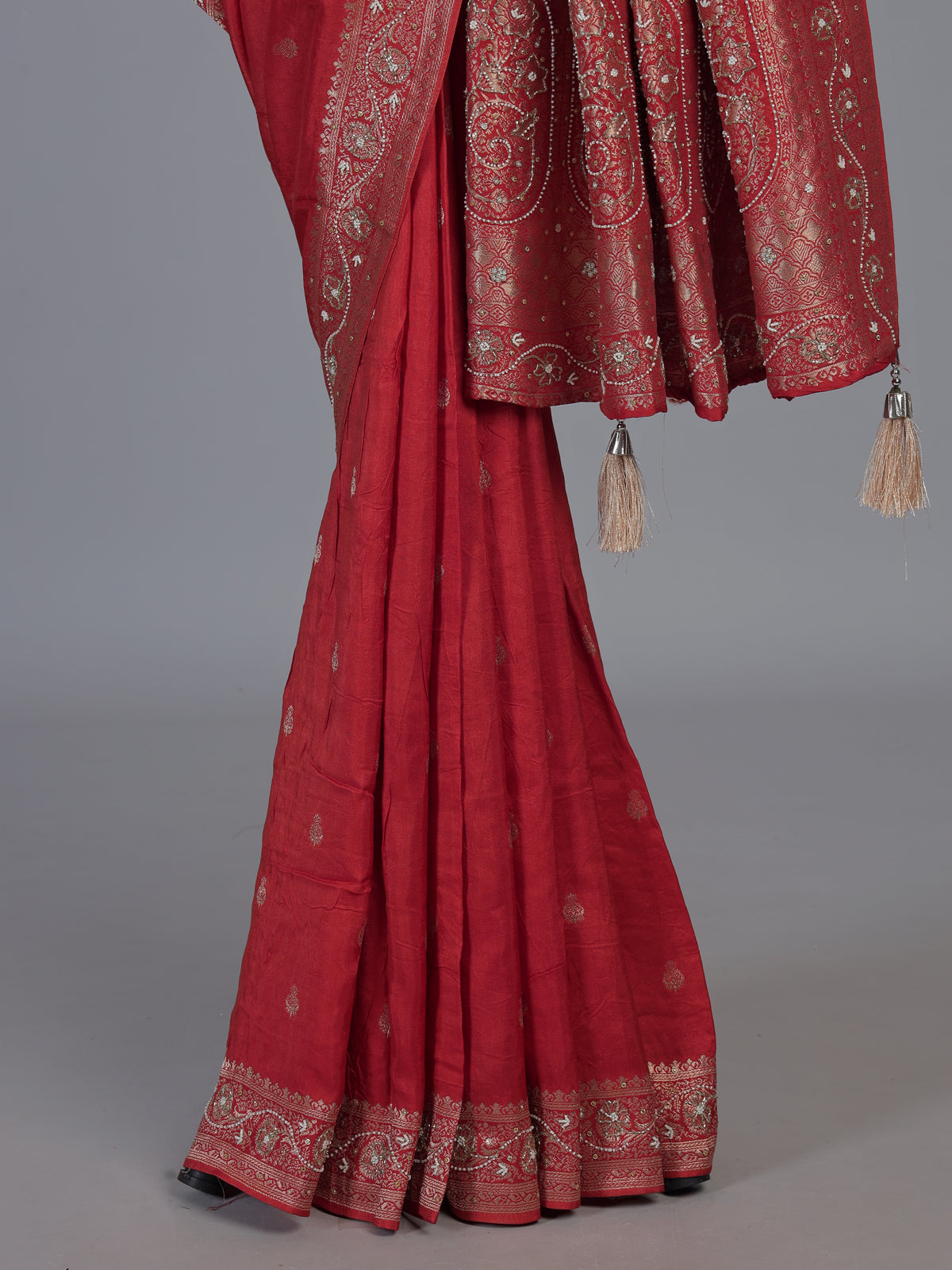 Orange dola silk saree with traditional butti work design