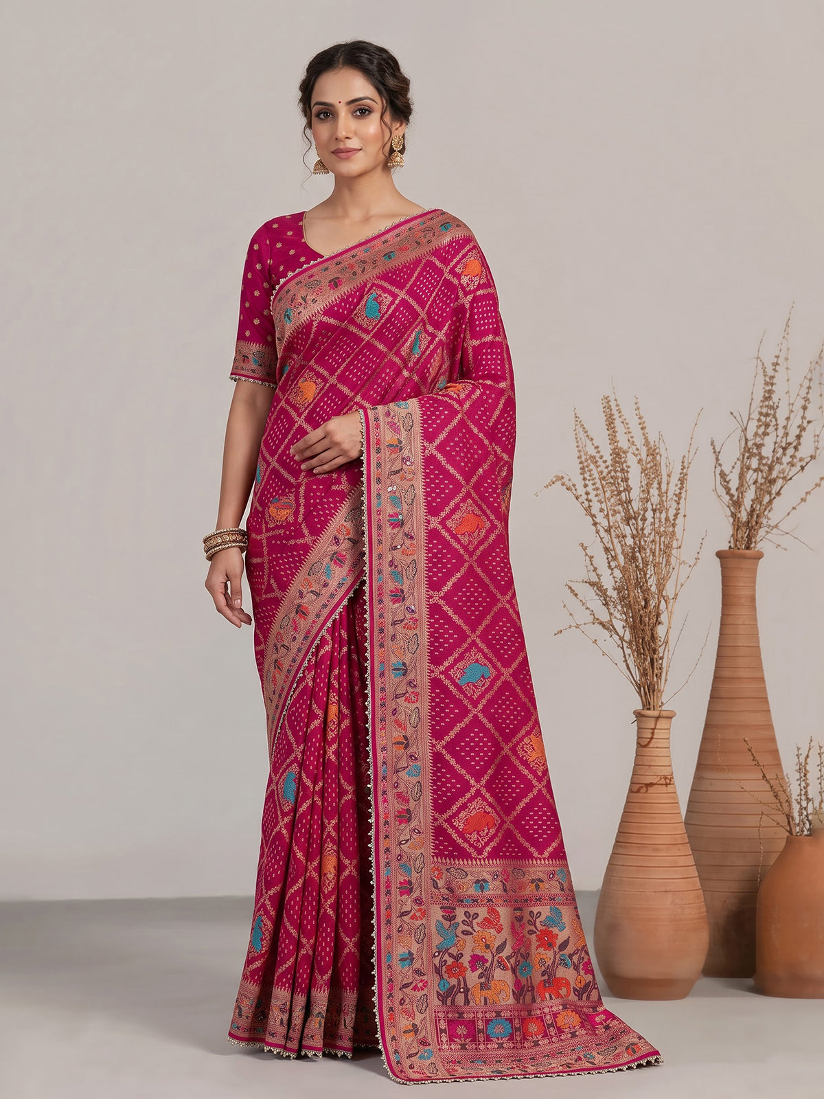 Pink georgette Bandhani saree with elephant motif handwork