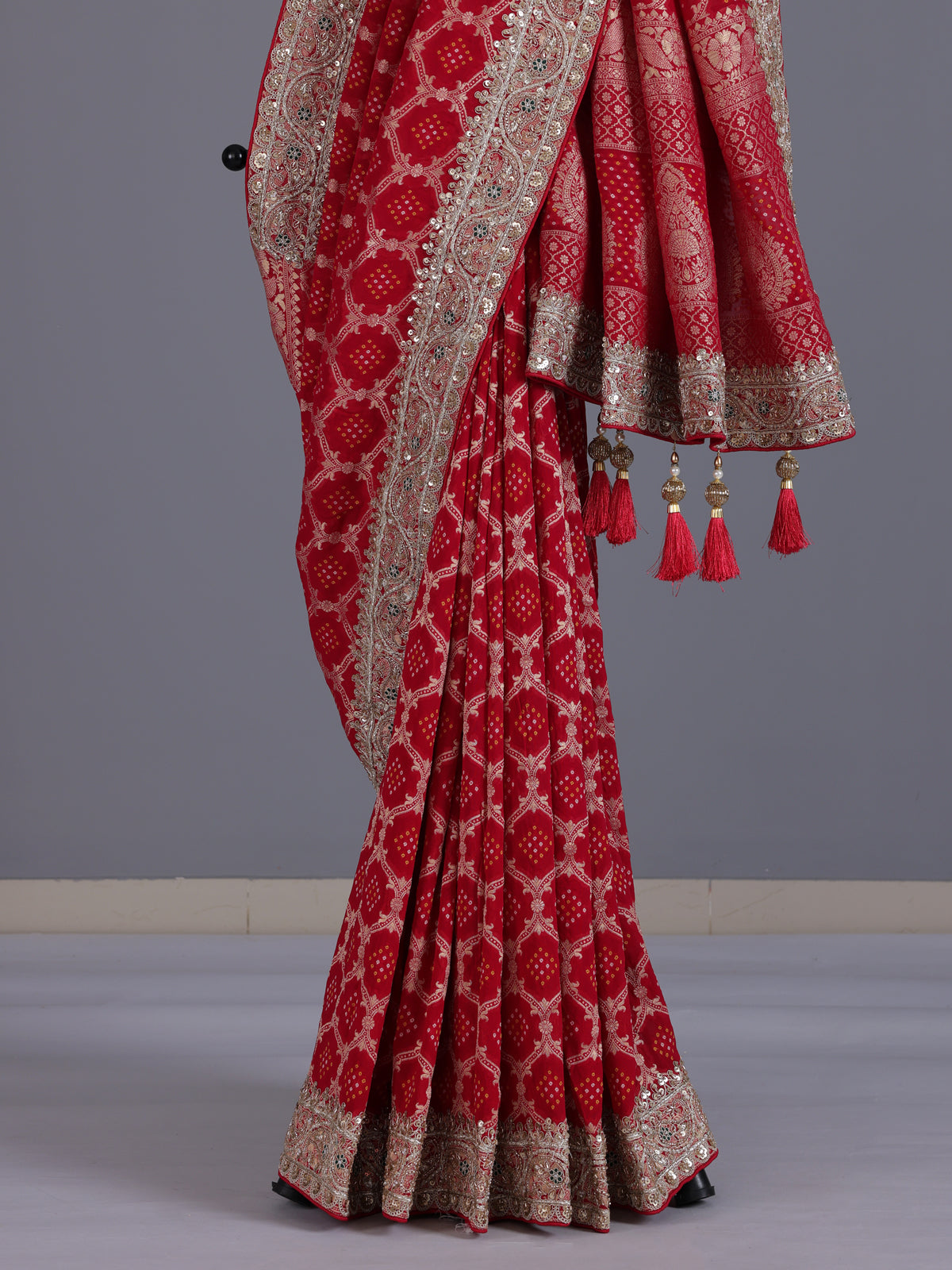 Rani pink bandhani semi georgette saree with tassel pallu elegance