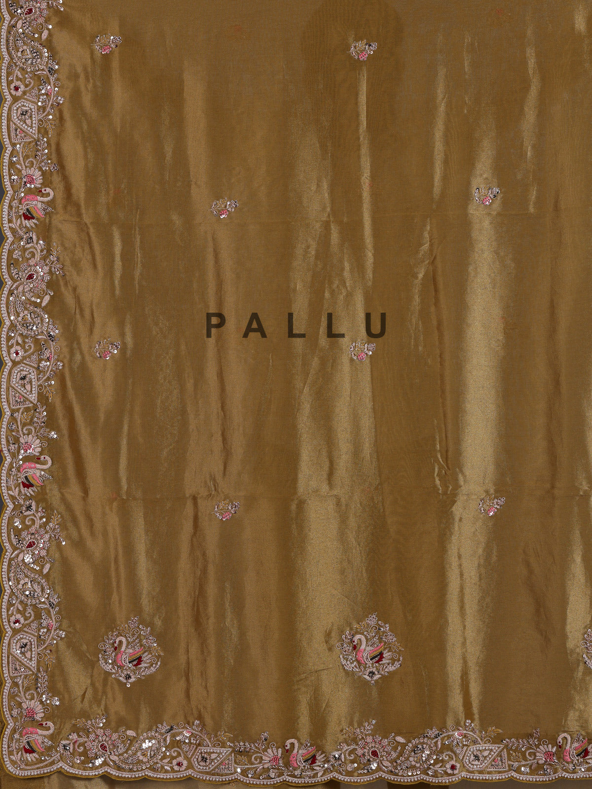 Gold tissue silk saree with bird motif border embellishments
