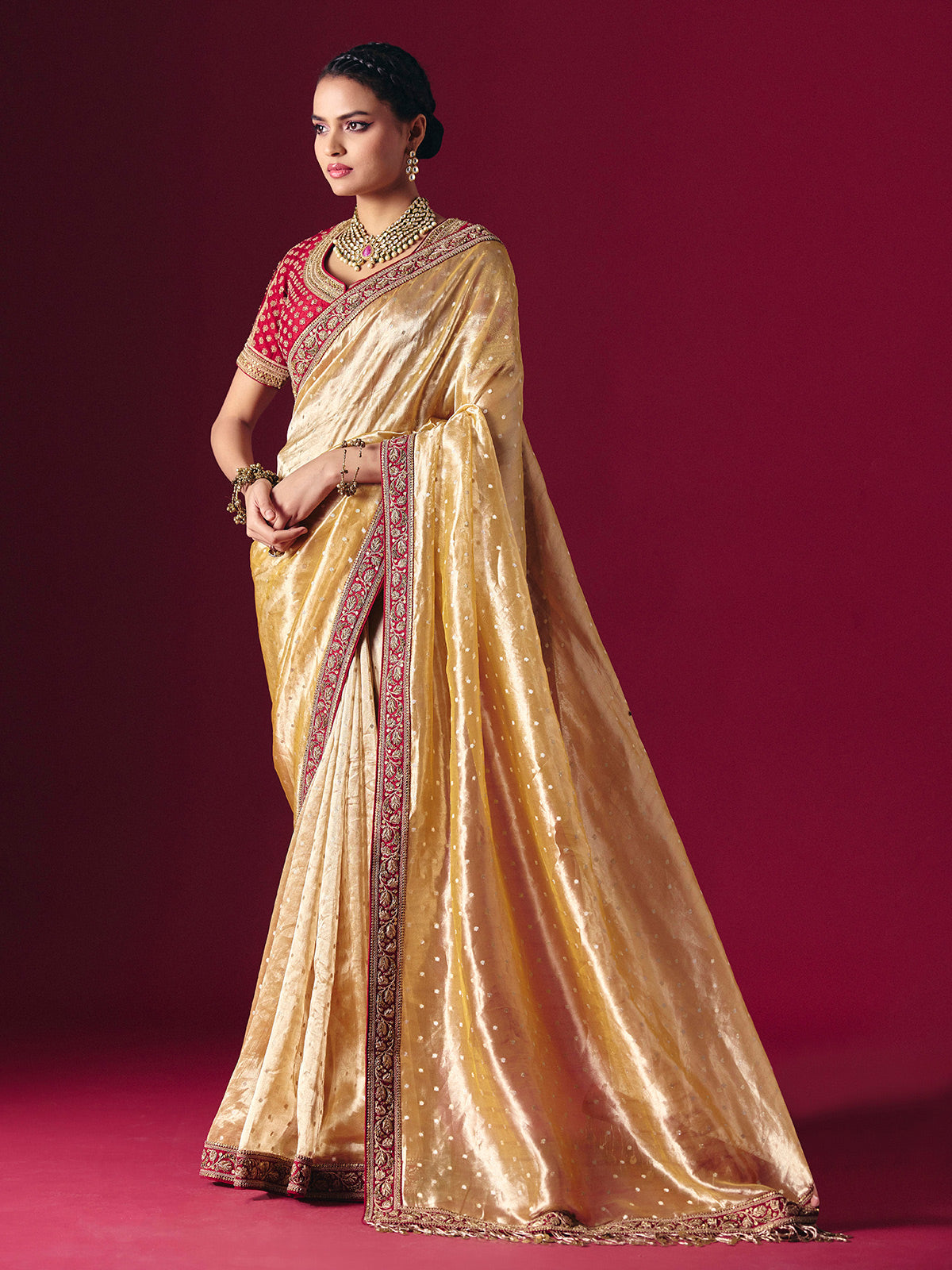 Pastel yellow tissue silk saree with luxurious zari zardosi embellishments