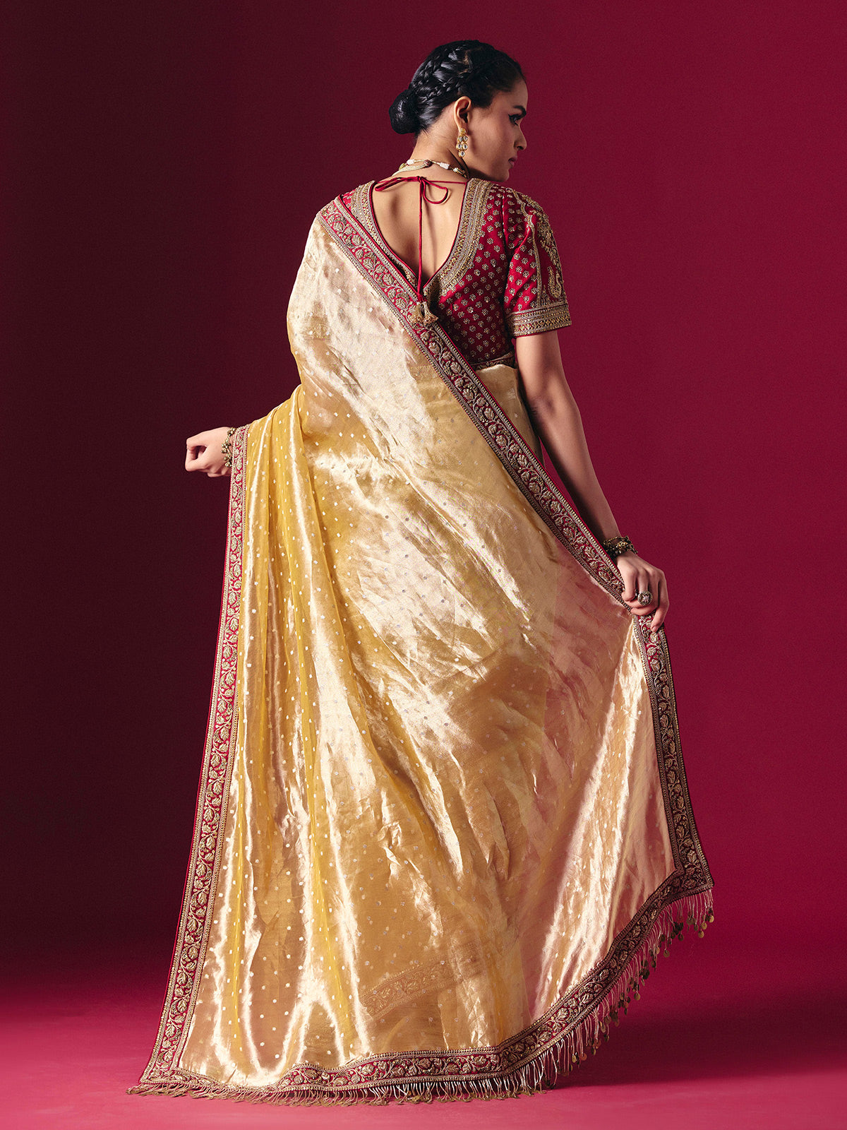Pastel yellow tissue silk saree with luxurious zari zardosi embellishments