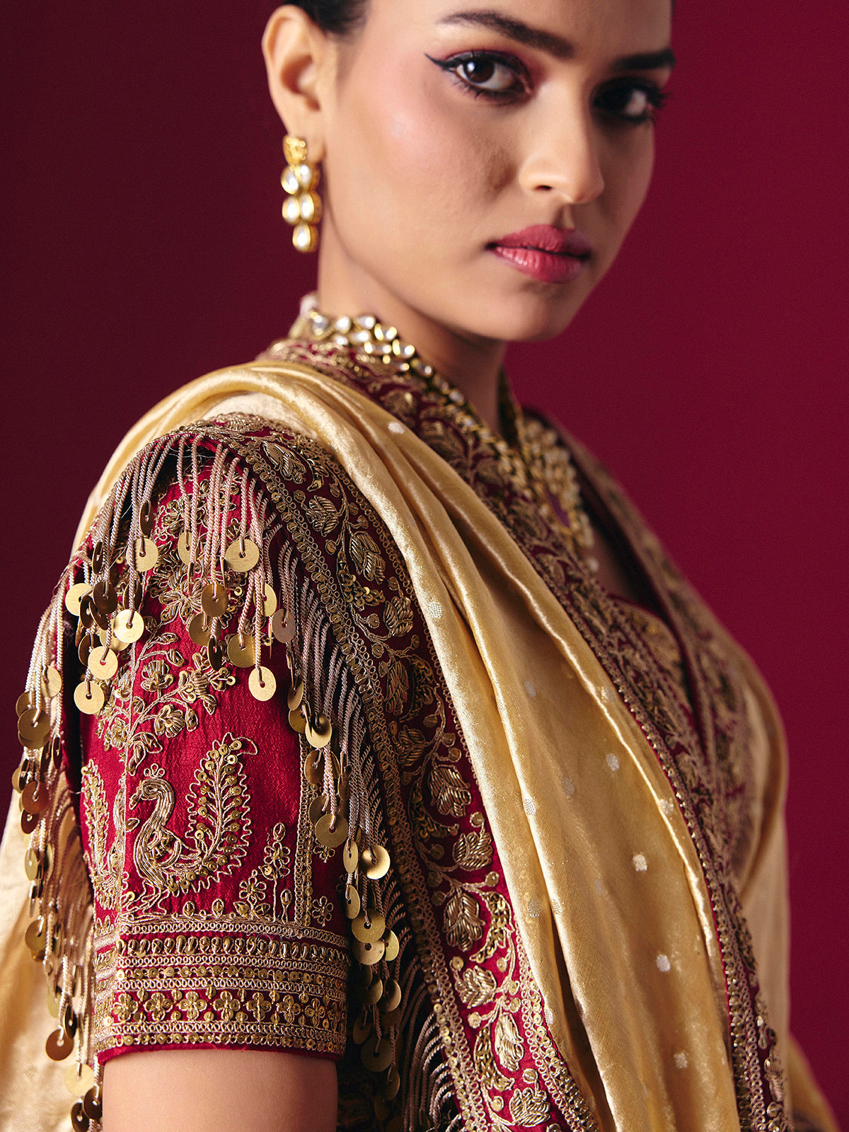 Pastel yellow tissue silk saree with luxurious zari zardosi embellishments