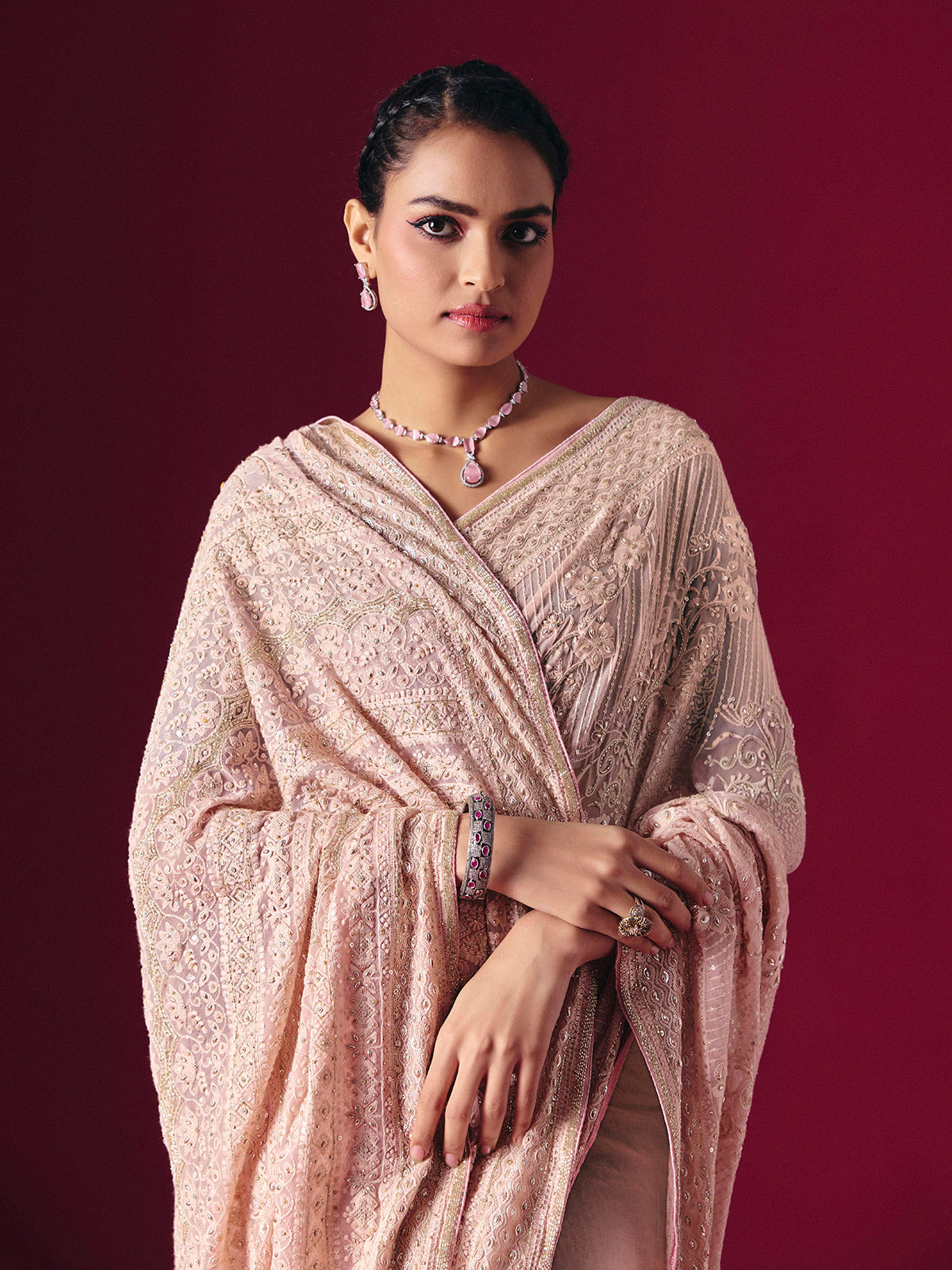 Blush pink Lucknowi georgette saree with elegant chikankari handcrafted detailing