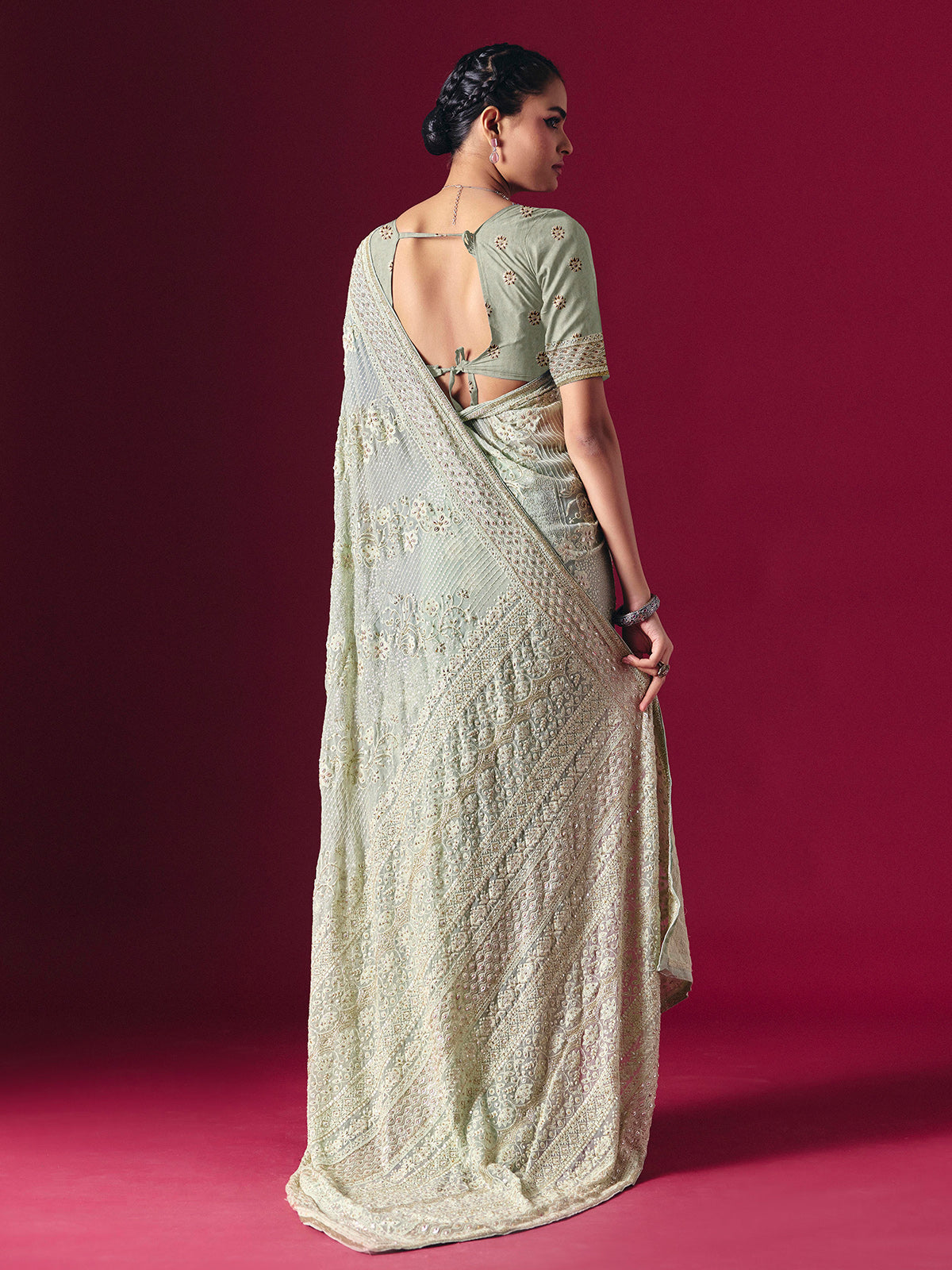 Sage green Lucknowi georgette saree with chikankari embellished designer elegance