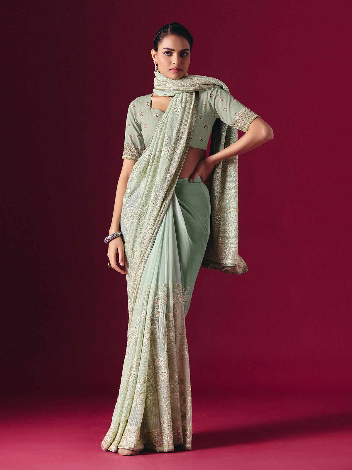 Sage green Lucknowi georgette saree with chikankari embellished designer elegance