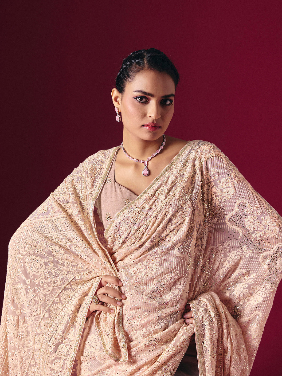 Light peach Lucknowi georgette saree with chikankari designer detailing