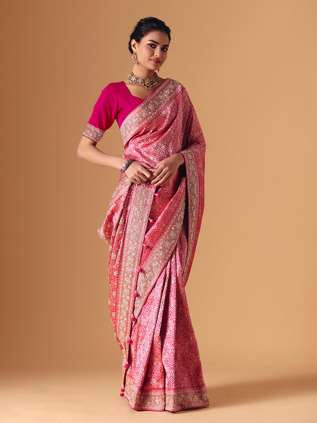 Magenta pink banarasi silk saree with regal embellished bridal elegance