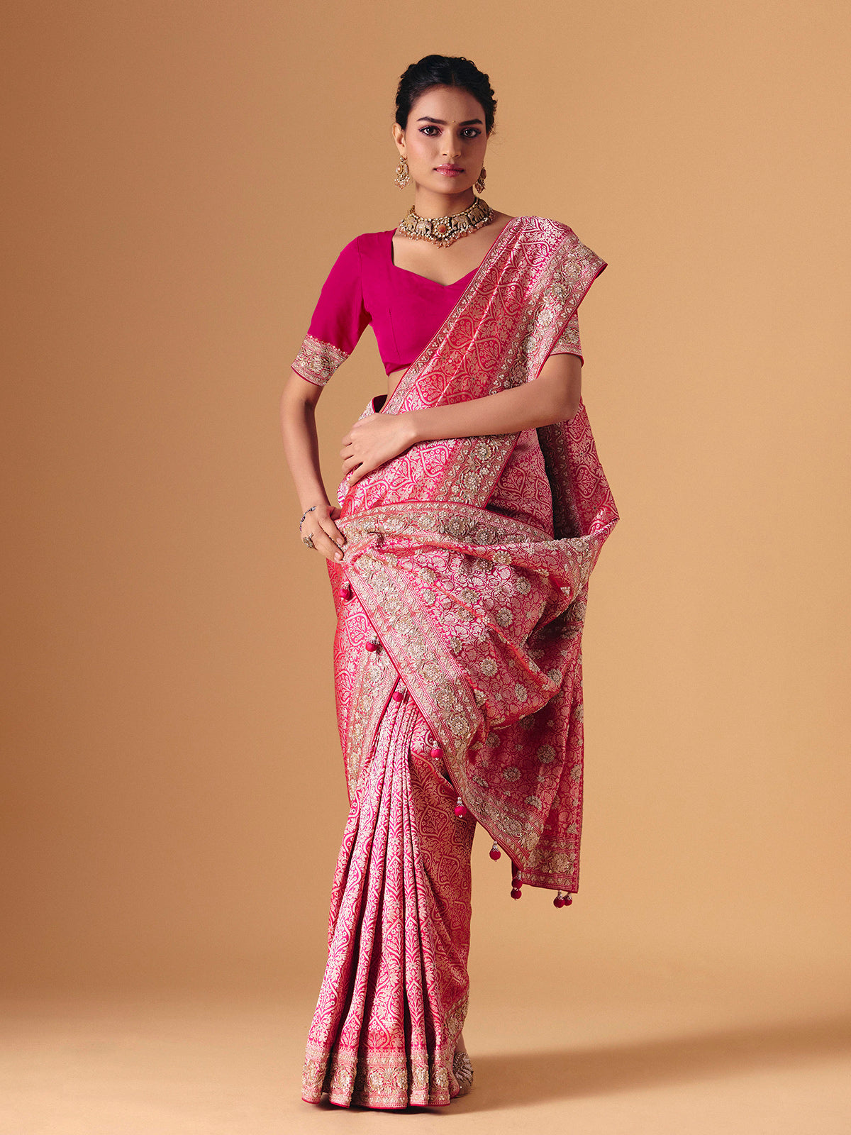Magenta pink banarasi silk saree with regal embellished bridal elegance