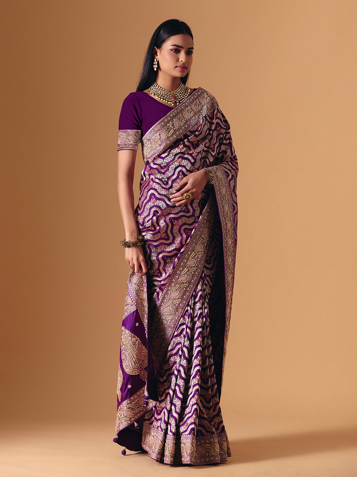 Deep purple banarasi silk saree with intricate bridal zari craftsmanship