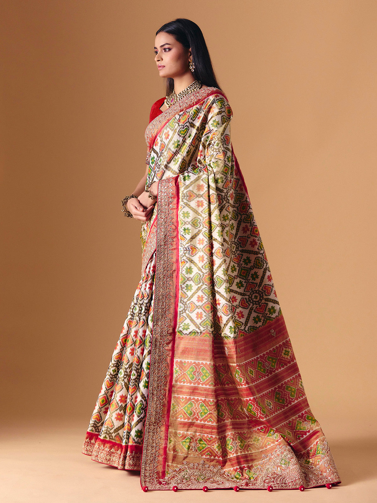 Off white Hyderabadi patola silk saree with gota pati elegance