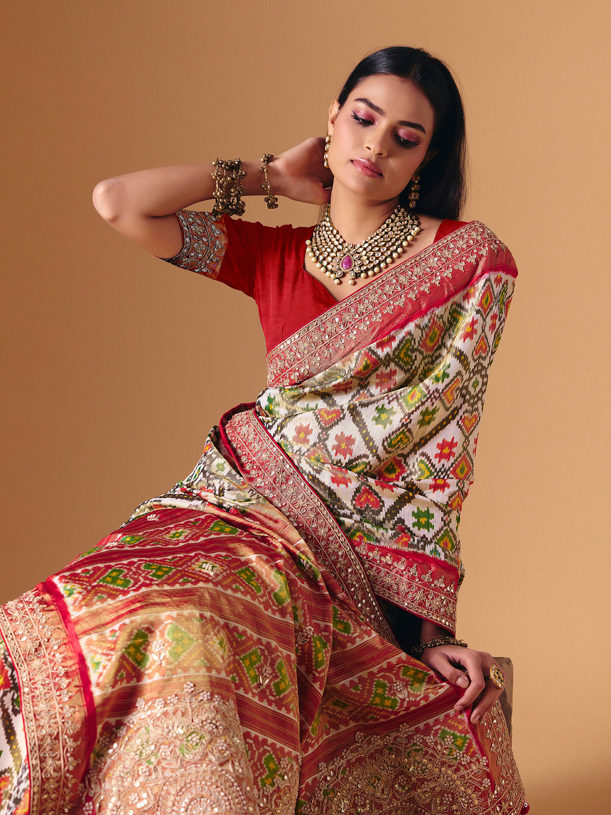 Off white Hyderabadi patola silk saree with gota pati elegance