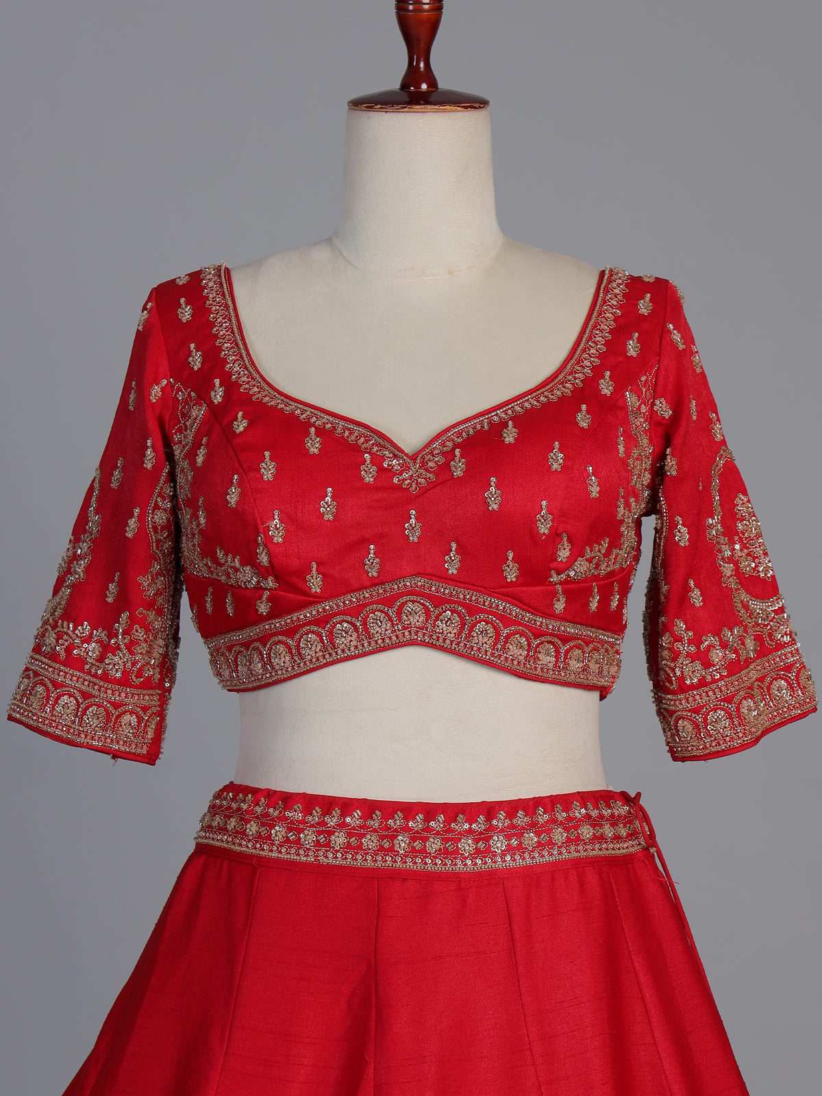 Red raw silk elephant and motif bridal lehenga choli