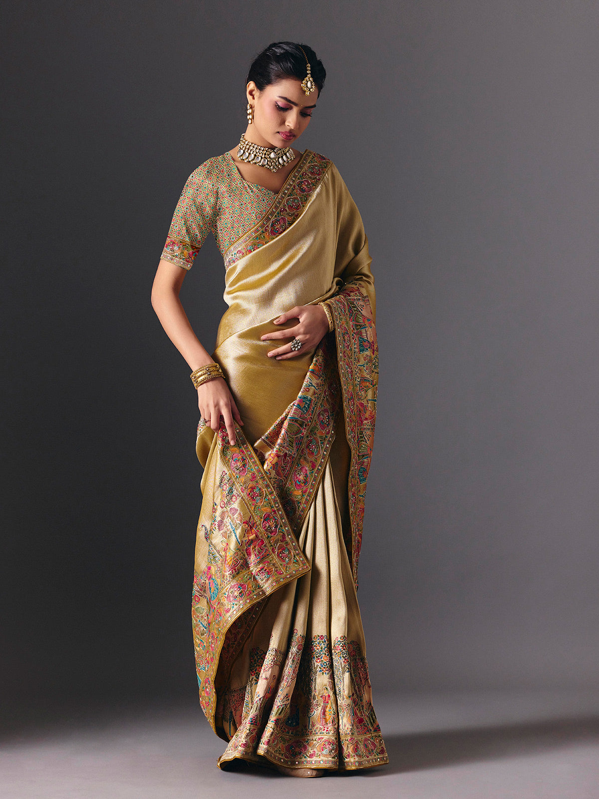 Gold tissue silk bridal saree with luxurious zardosi zari work
