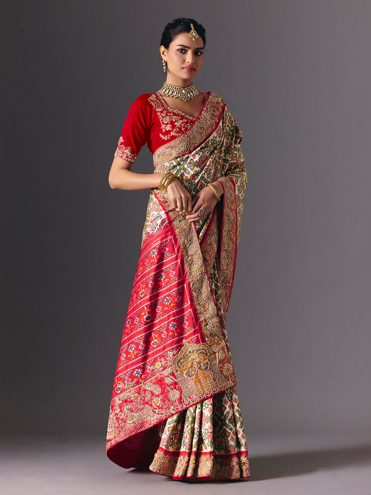 Cream Hyderabadi patola silk saree with elegant festive zari detailing