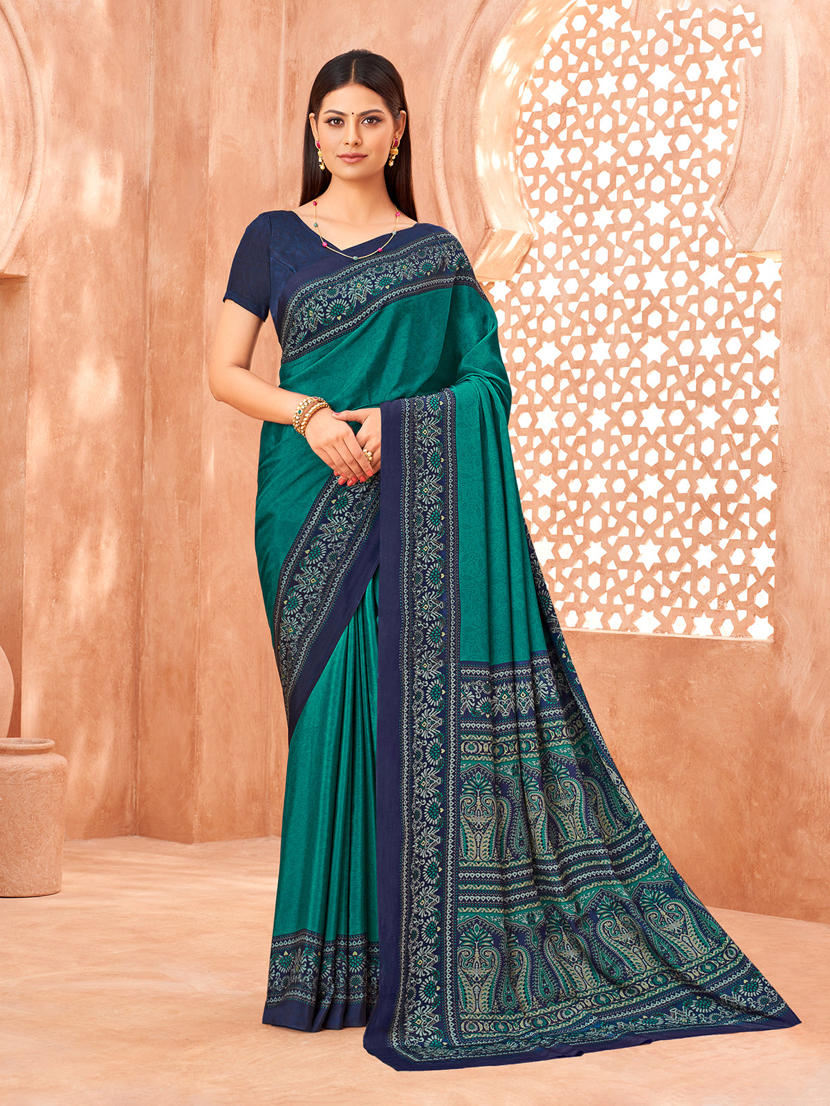 Rama green printed contrast border and pallu crepe silk saree