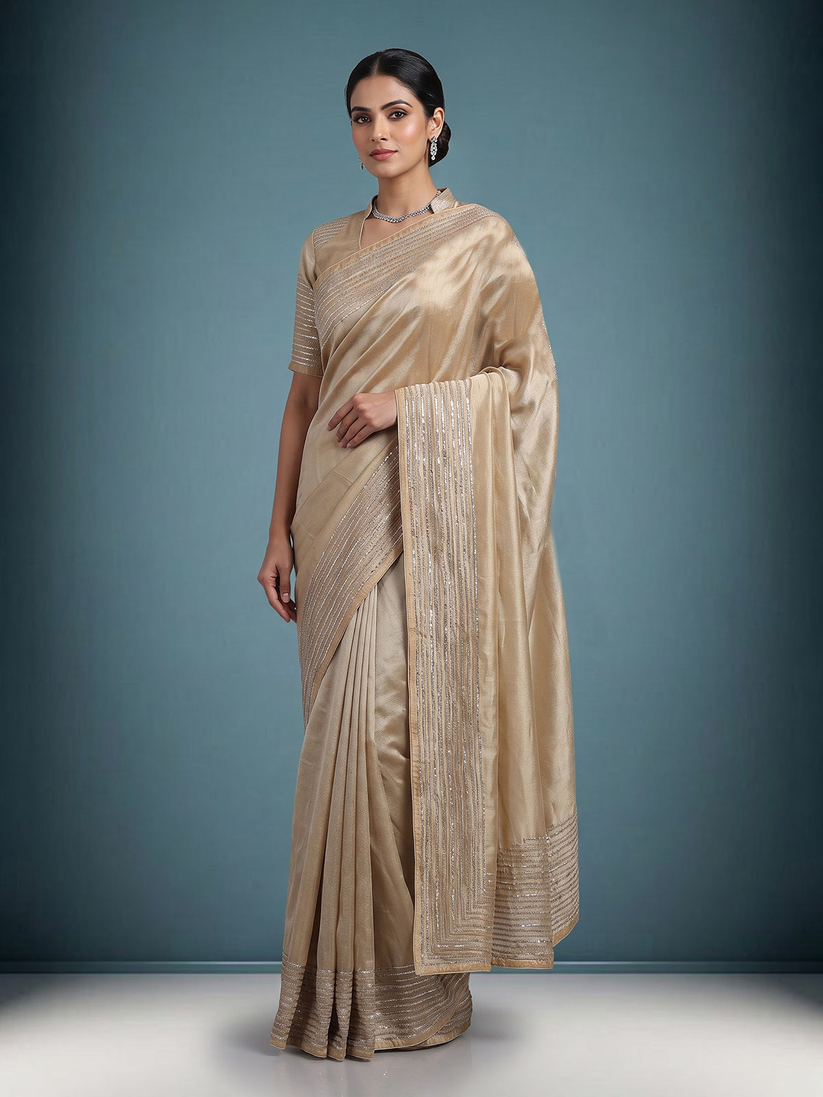 Beige metallic pleated tissue silk saree women