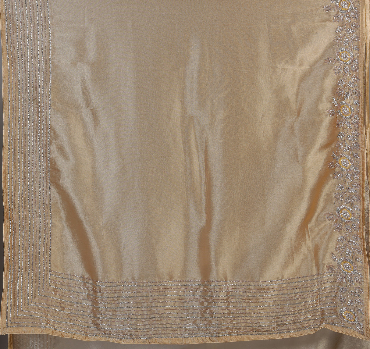 Beige metallic pleated tissue silk saree women