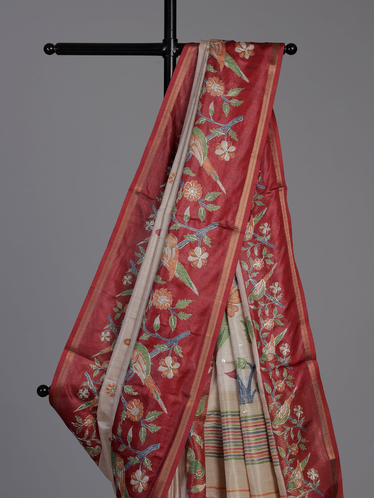 Beige and maroon art tusser silk saree with floral bird motifs