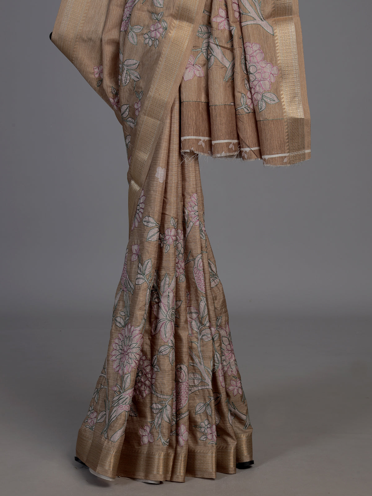 Pastel beige cotton silk saree with elegant bird motifs