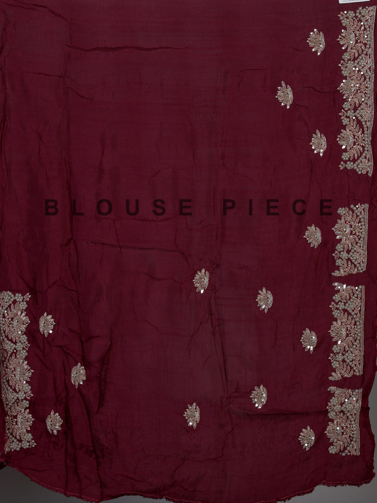 Pastel grey tissue silk saree with delicate pearl zari embellishments