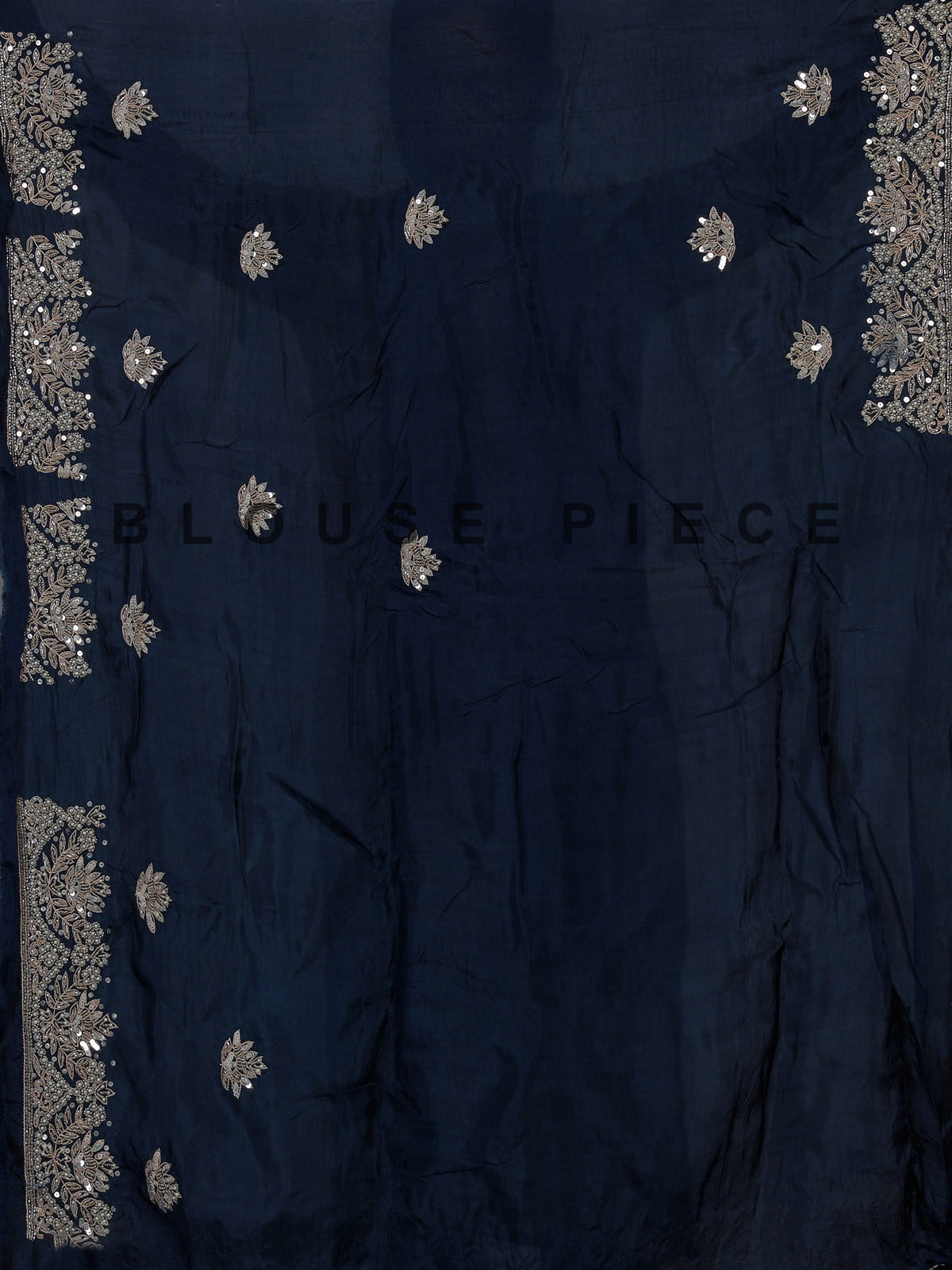 Pastel rama green tissue silk saree with elegant embellishments