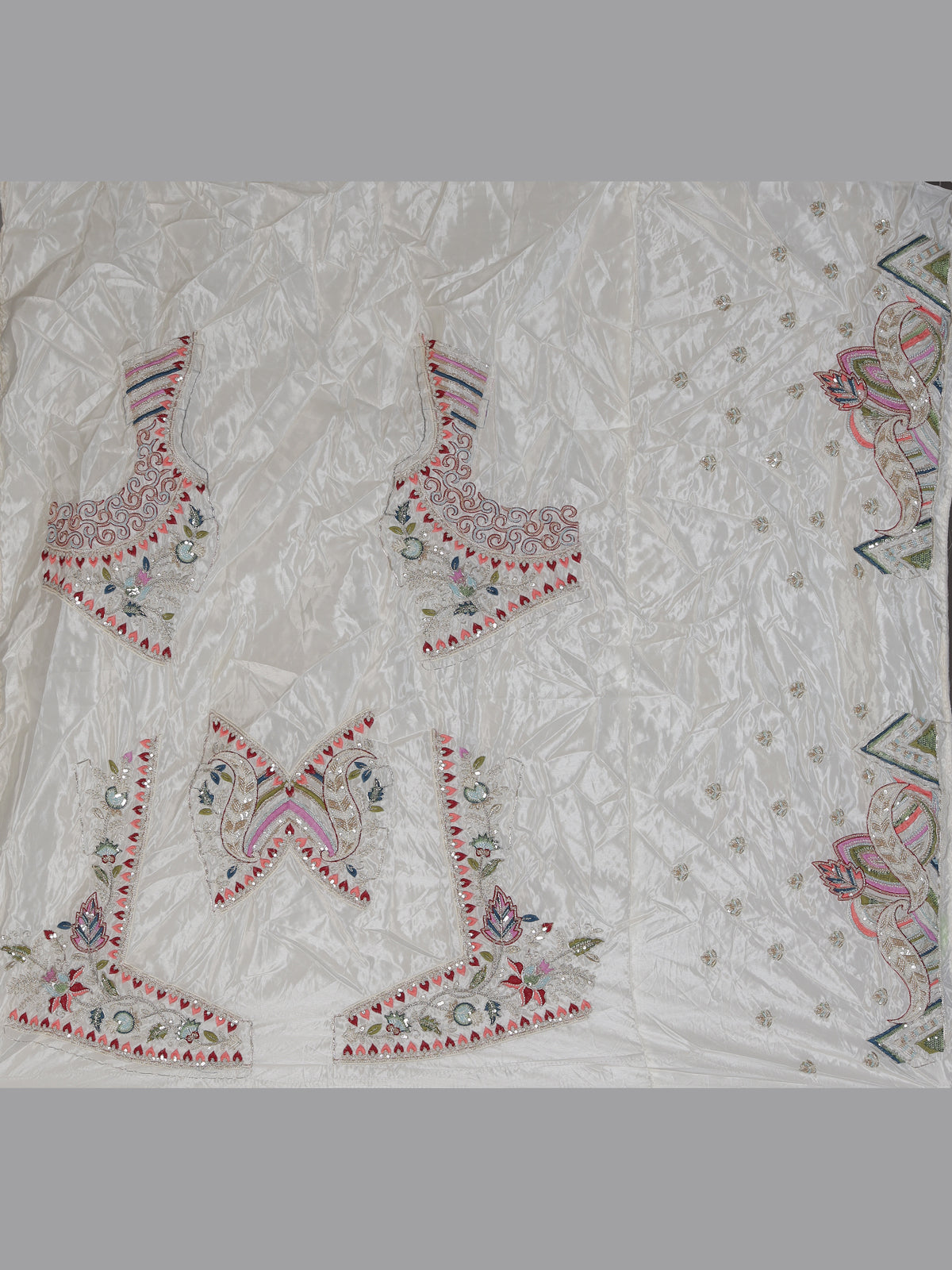 White tissue silk lehenga choli featuring exquisite zardosi embellishments