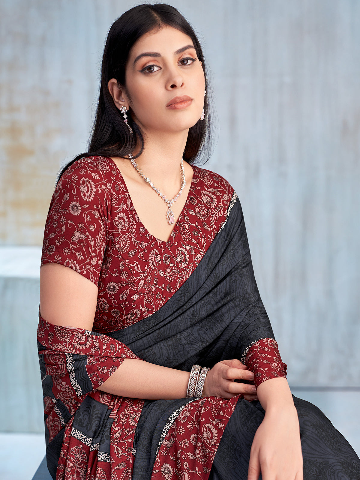 Charcoal black floral printed contrast border and pallu saree