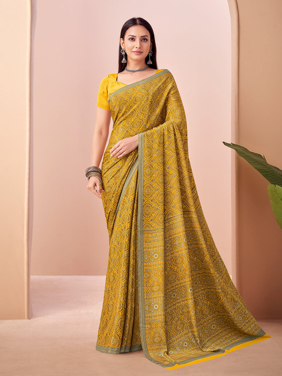 Mustard yellow printed casual crepe silk saree with unstitched blouse