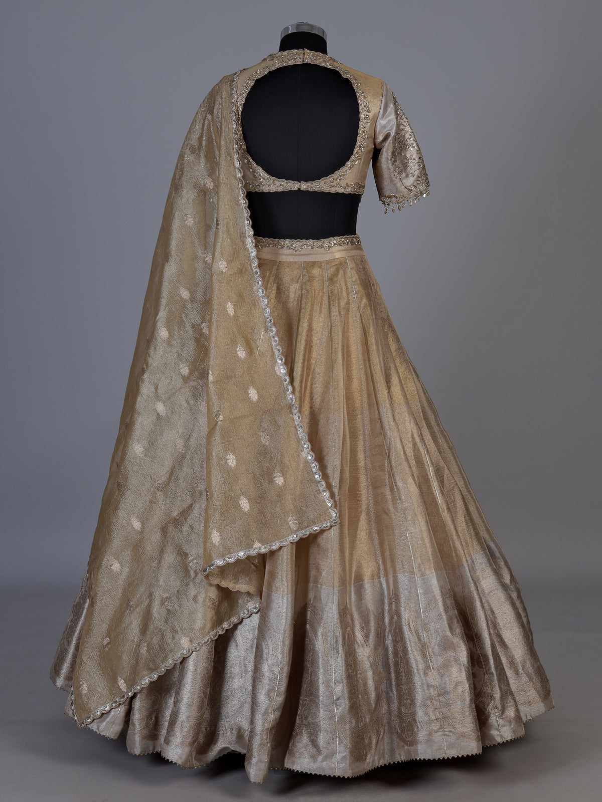 Golden silk lehenga choli with zardosi gota and zari embellishments