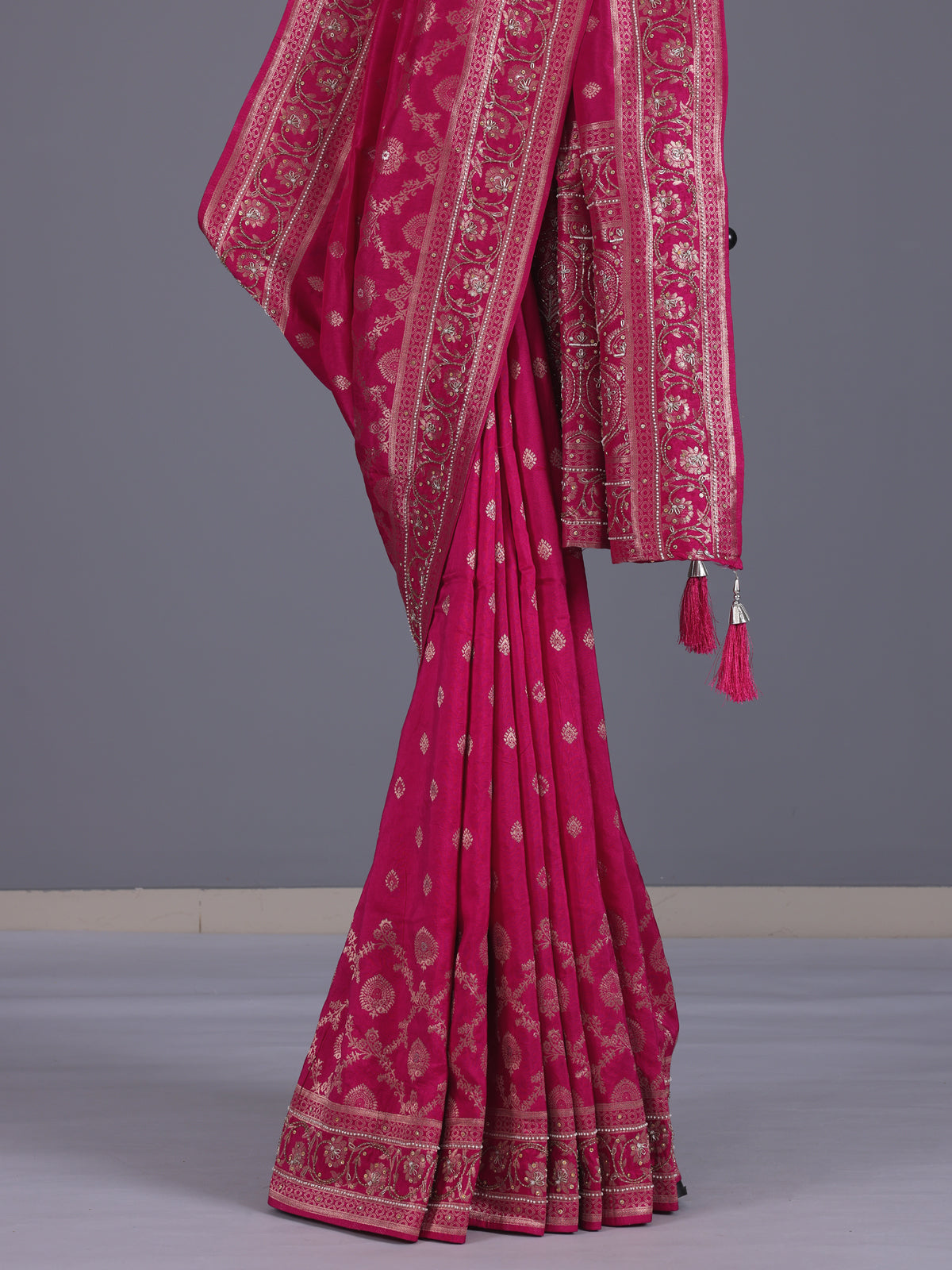 Rani pink silk saree with elegant butti work