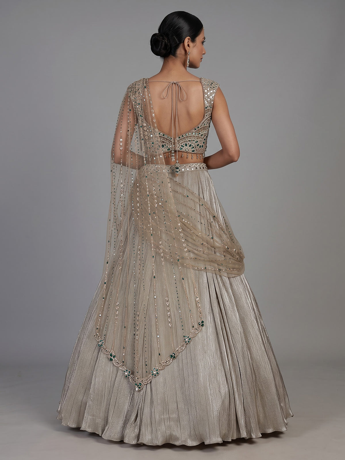 Gold womens emerald stone lehenga choli