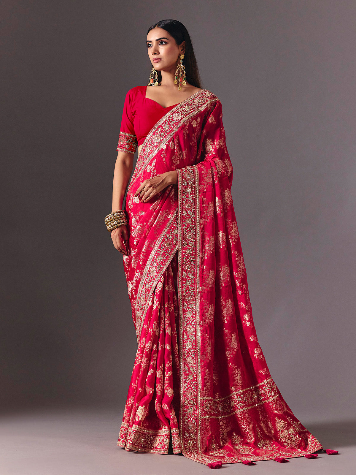 Rani pink satin silk saree with luxurious zari embellishments