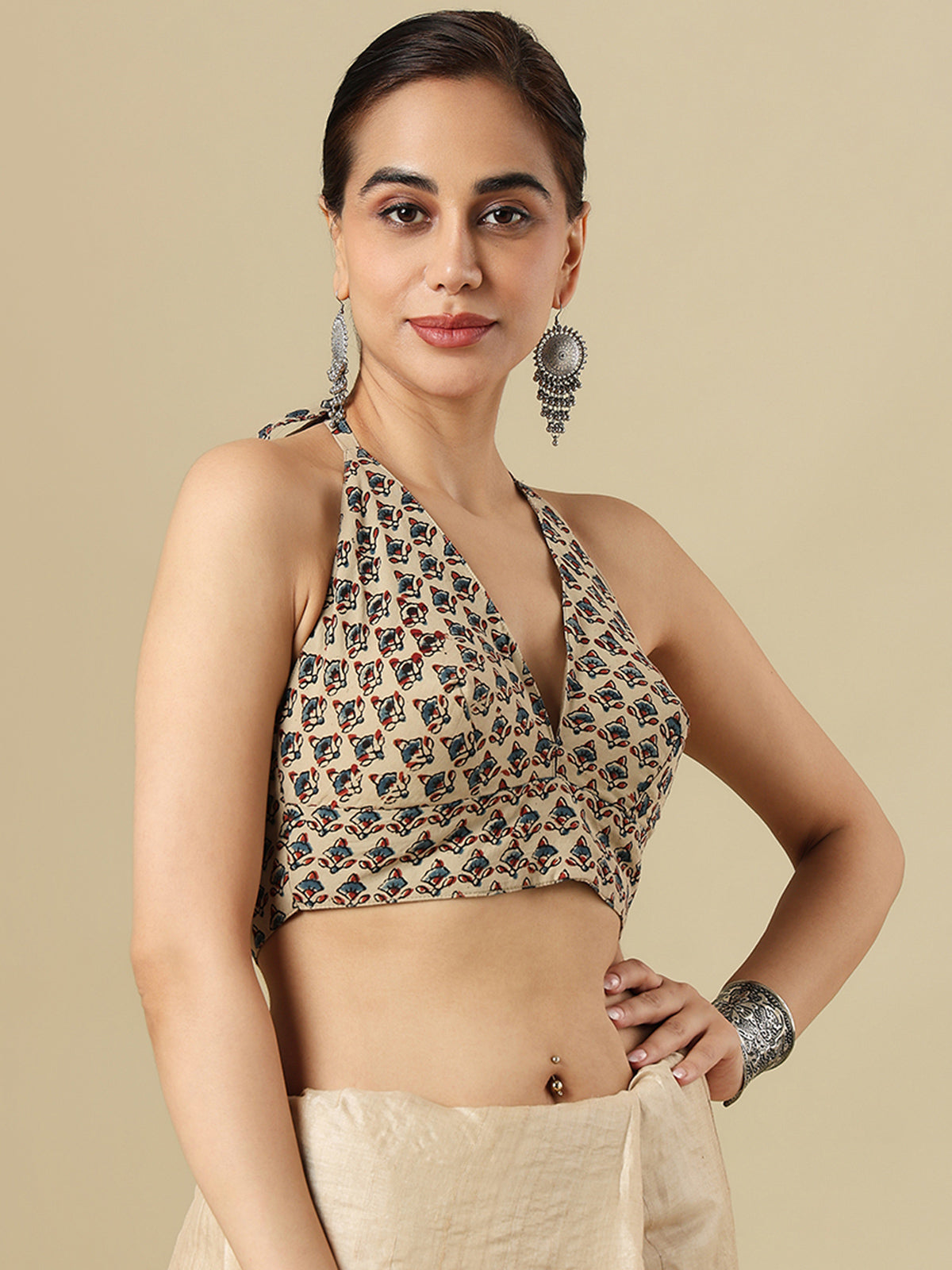 Beige cotton printed blouse with halter neckline and back opening