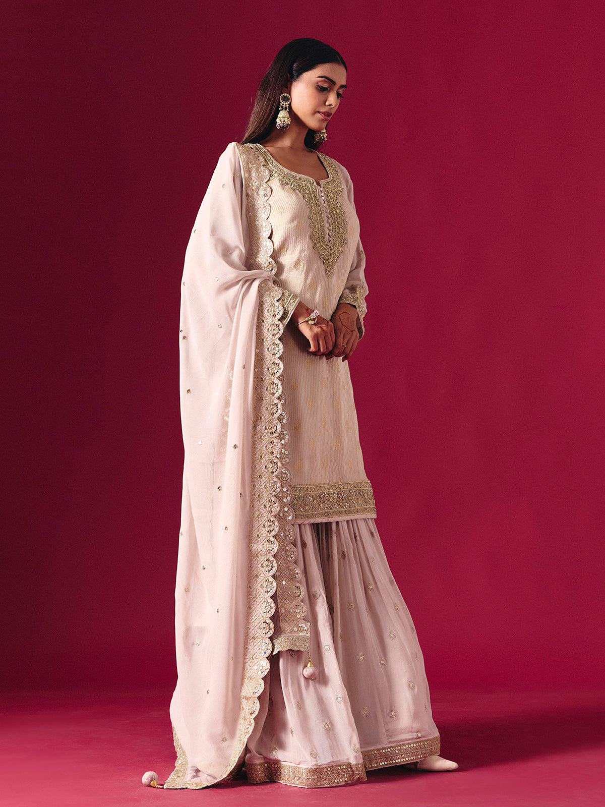 Light pink silk sharara suit with zari embellished elegance