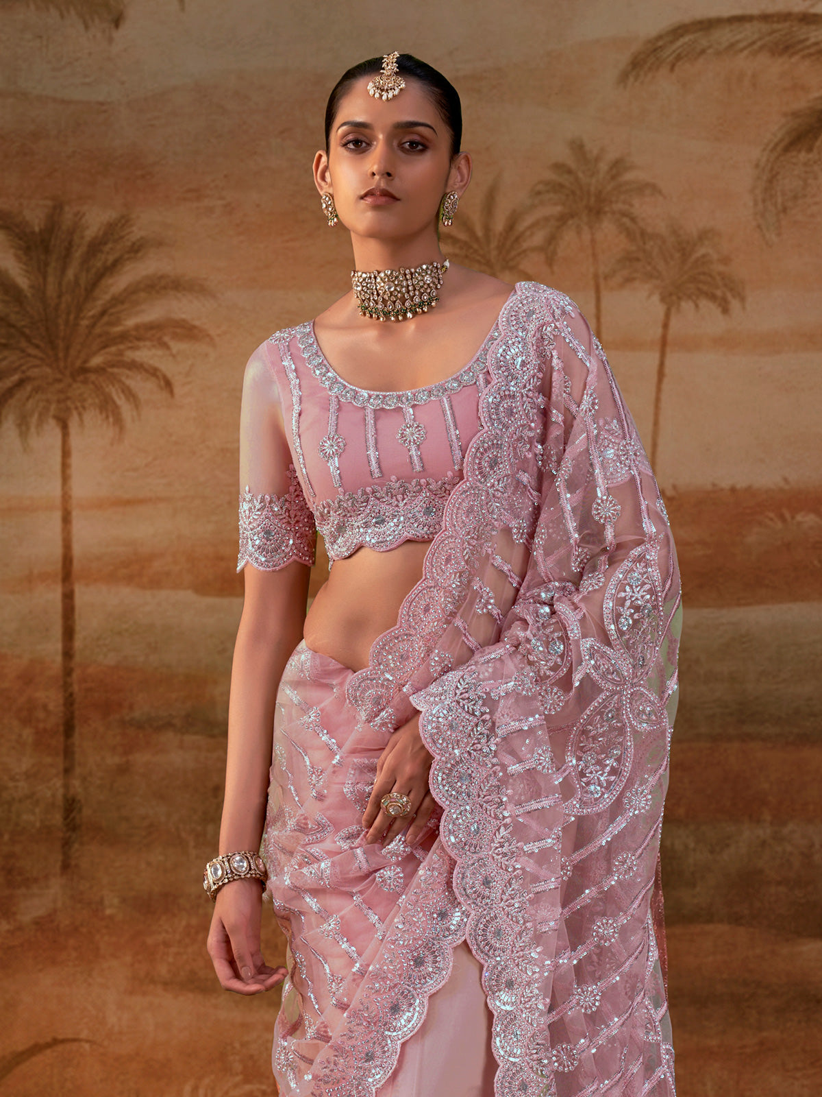 Pink net womens embellished saree with unstitched blouse