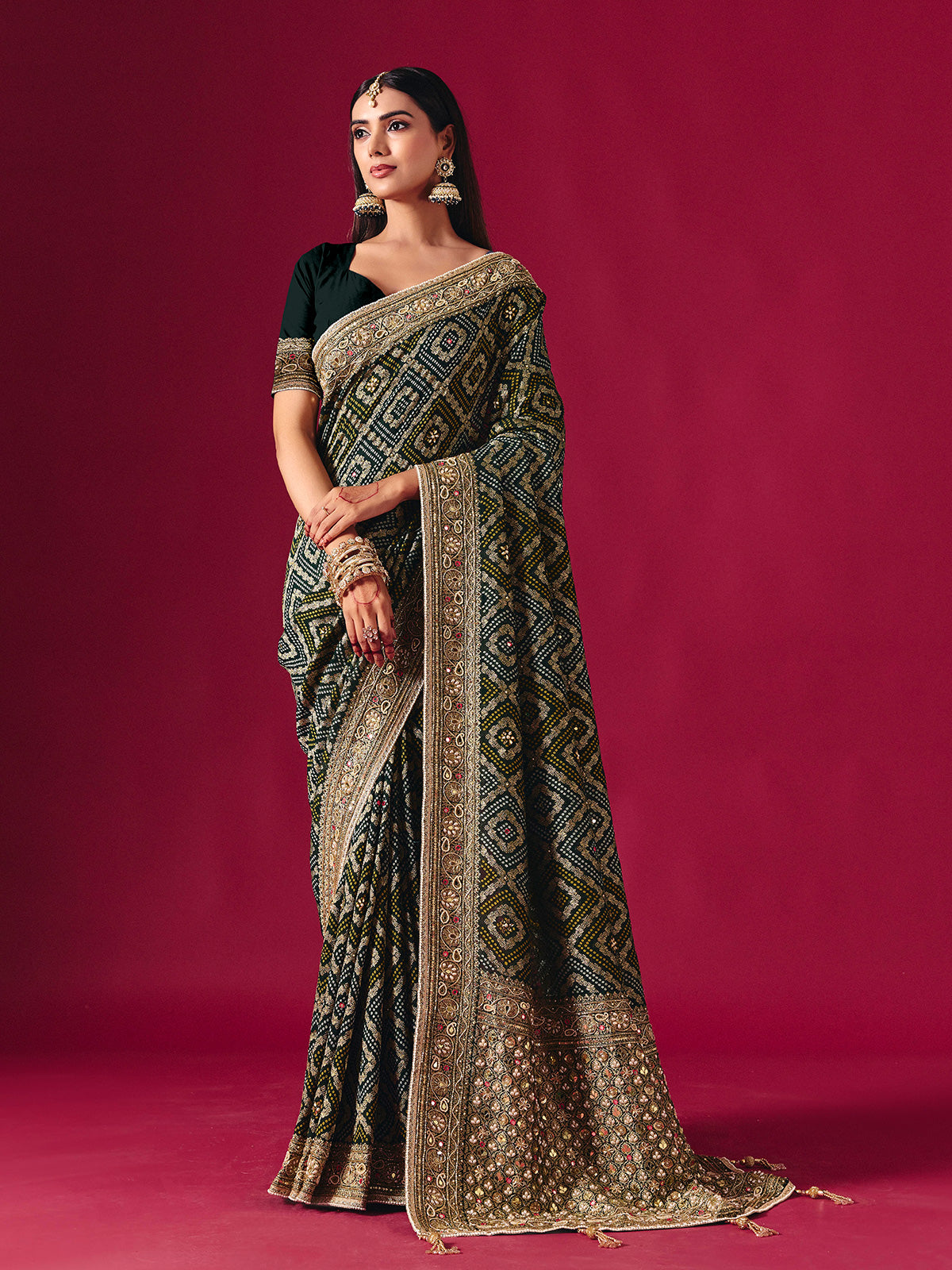 Green georgette saree with festive embellishments