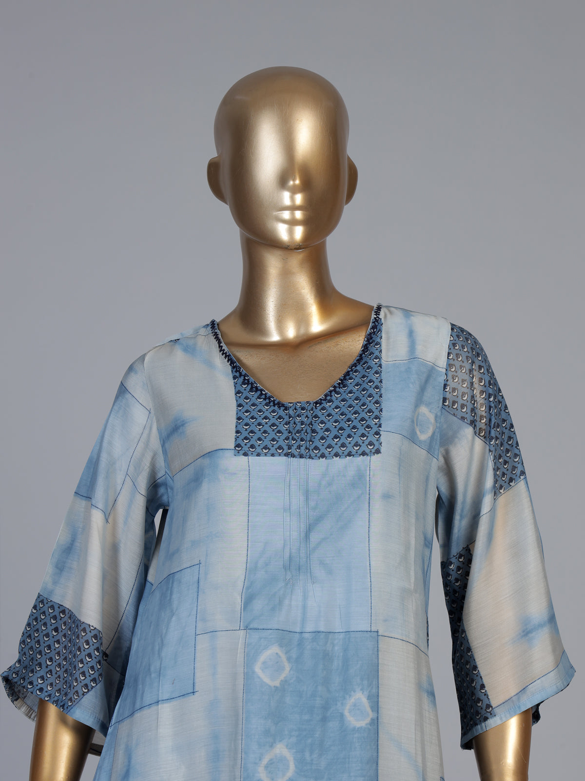 Blue silk kurti set with refined printed pant and V neckline