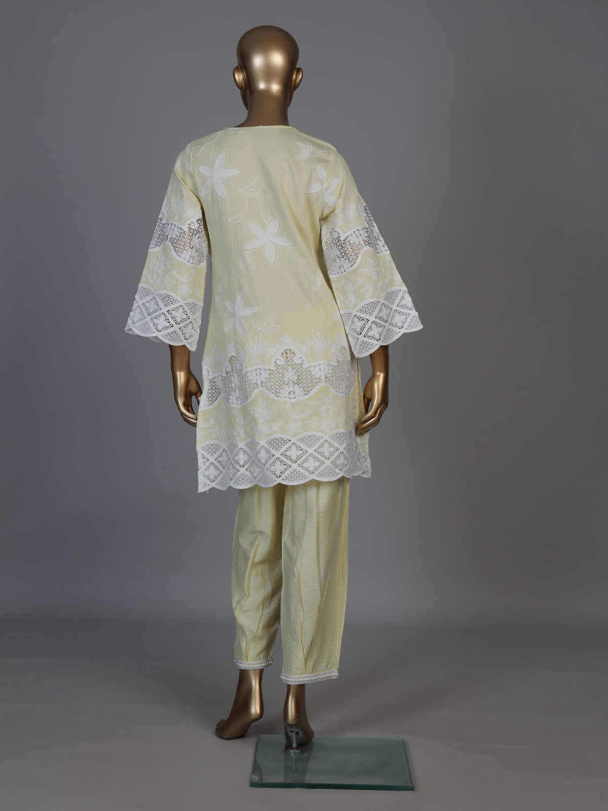 Radiant yellow cotton blend kurti set with pearls and cutwork