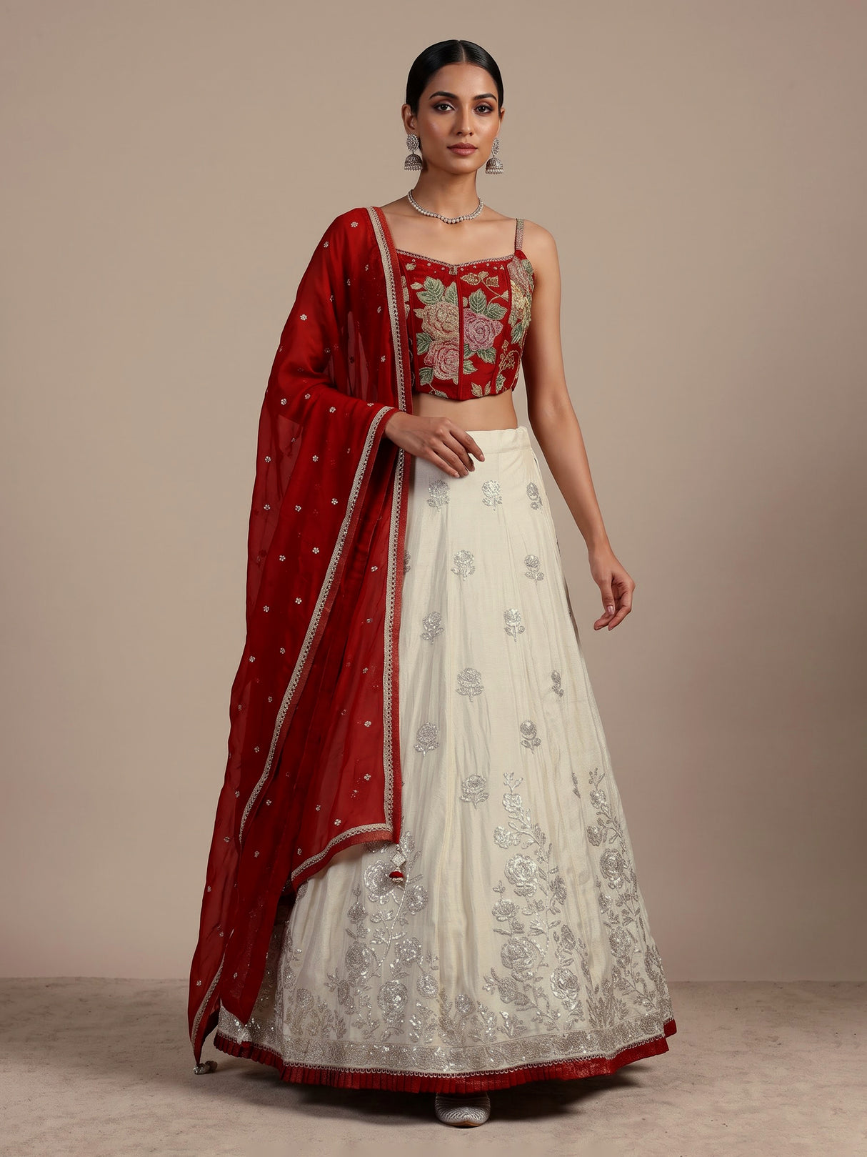 Stunning red silk lehenga choli with resham and diamond embellishments