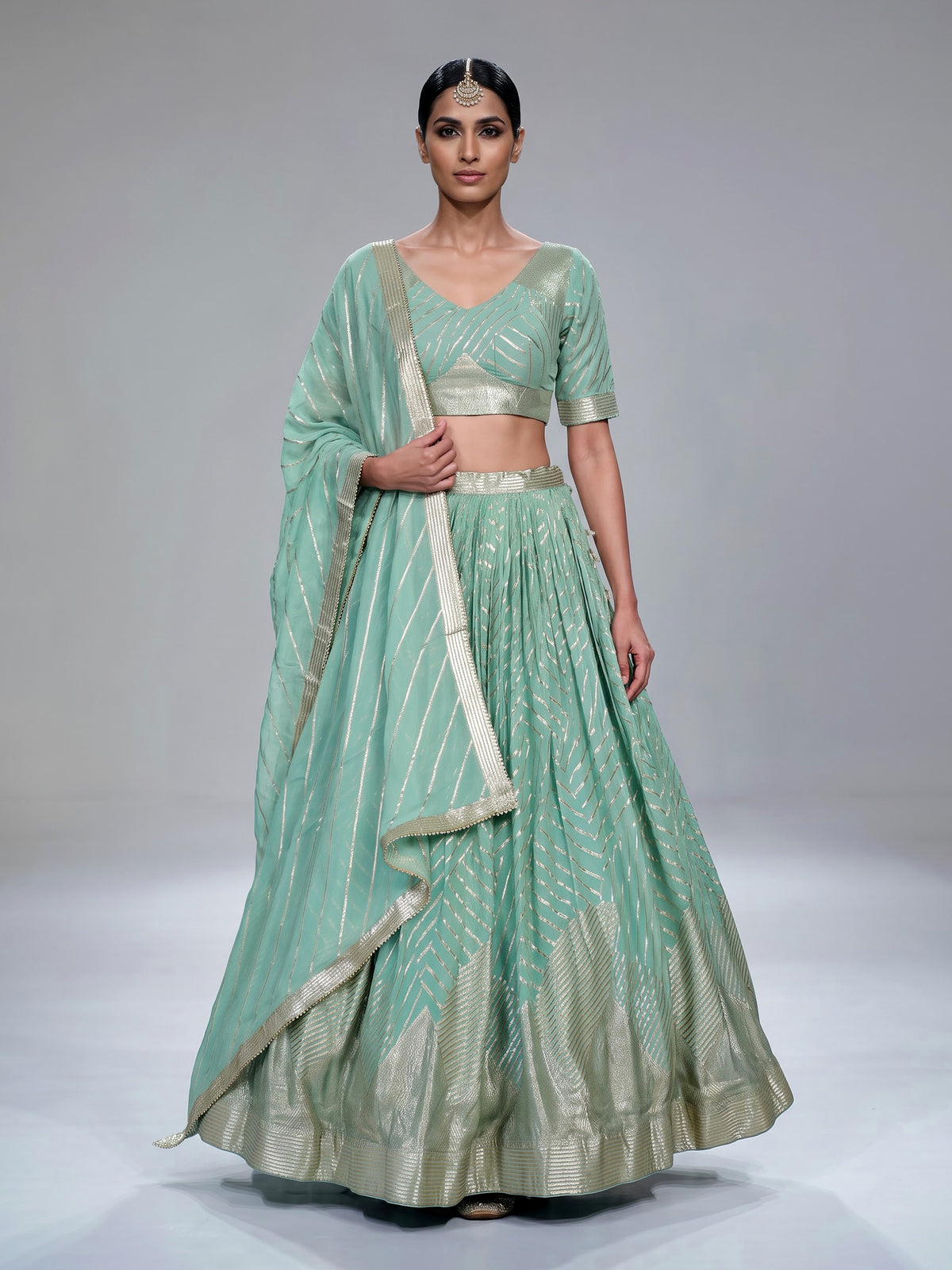 Sky blue gota patti embellished women’s georgette lehenga choli