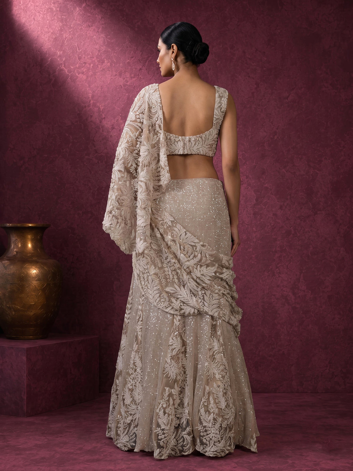 Light wine embroidered designer women’s net lehenga choli