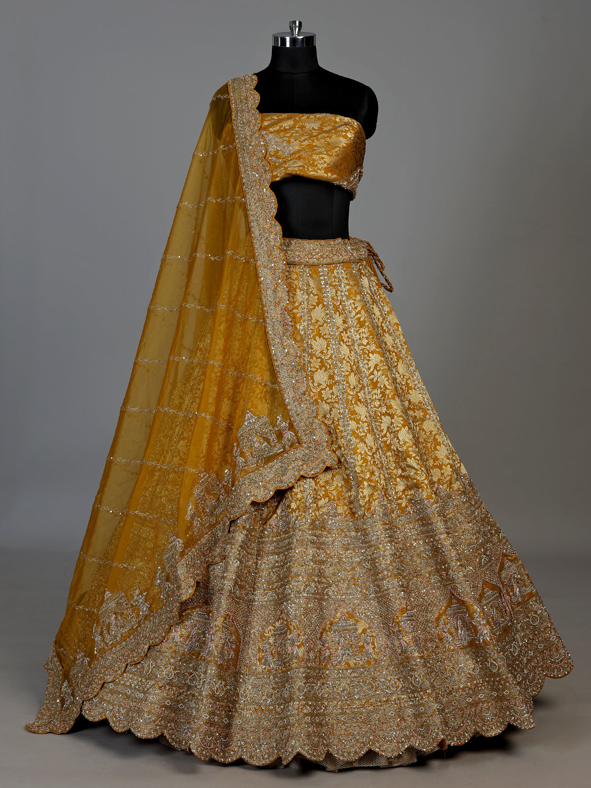 Mustard yellow cutdana zari embellished women’s raw silk lehenga choli